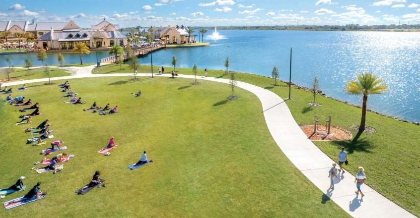 Lakefront lawn and walking path in Lakewood Ranch